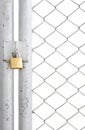 Chain link fence and metal door with lock Royalty Free Stock Photo