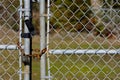 Chain Link Fence and Old Rusted Pad Lock Royalty Free Stock Photo