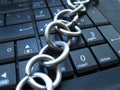 Chain and lock on laptop keyboard. Computer ban, internet ban. Addiction. Anti virus Royalty Free Stock Photo