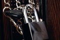 Chain and lock on a wooden door Royalty Free Stock Photo