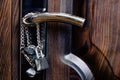 Chain and lock on a wooden door Royalty Free Stock Photo