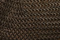 chain mail cloth, steel rings on wood surface Royalty Free Stock Photo