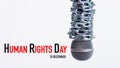 Chain on microphone with HUMAN RIGHTS DAY 10 december text Royalty Free Stock Photo