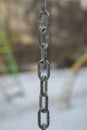 Chain old attached to a steel frame, Chain for towing, Binding bound with iron chains, The bond with steel chains. Royalty Free Stock Photo