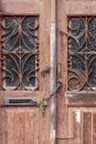 Chain and padlock on an old wooden door Royalty Free Stock Photo