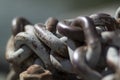 Chain with rusty thick links on a dock