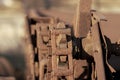 Chain and sprocket wheel on a rusty farm machine