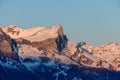 The Chaine des Fiz and its orange colors in Europe, in France, Rhone Alpes, in Savoie, in the Alps, in winter, on a sunny day