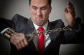 Chained businessman Royalty Free Stock Photo