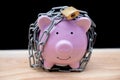Chained piggy bank and lock money savings with chain and keys. Money security concept