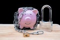 Chained piggy bank and lock money savings with chain and keys. Money security concept