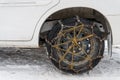 Chained tire snow road