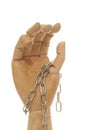 Chained wooden dummy hand Royalty Free Stock Photo