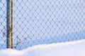 Chain link fence in snow Royalty Free Stock Photo