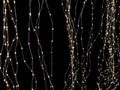chains of light on a dark blue background resemble a starry sky at night. Royalty Free Stock Photo