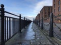 Chains and locks on pier of Liverpool old city part with  ocean on right side Royalty Free Stock Photo