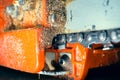 Chainsaw chain on the tire close-up. Saw teeth for cutting wood on a blurred background. Agricultural tool Royalty Free Stock Photo