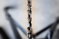 Chainsaw chain on the tire close-up. Saw teeth for cutting wood on a blurred background. Agricultural tool Royalty Free Stock Photo