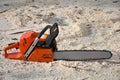 Chainsaw on the ground after work Royalty Free Stock Photo