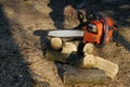Chainsaw to cut a wooden background