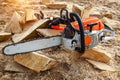 Chainsaw for a tree. Sawing firewood outdoors Royalty Free Stock Photo