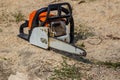 Chainsaw for a tree. Sawing firewood outdoors Royalty Free Stock Photo