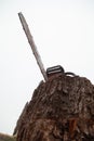 Chainsaw is on tree stump. Bottom view Royalty Free Stock Photo