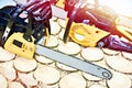 Chainsaws on wood in store Royalty Free Stock Photo