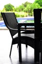 Chair along a swimming pool Royalty Free Stock Photo