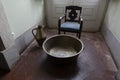 Chair and brass bowl