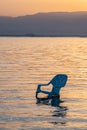 Chair in the Dead Sea in Israel Royalty Free Stock Photo