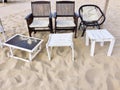 Chair, deck chair and table on the sand Royalty Free Stock Photo