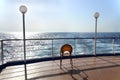 A chair on the deck of a cruise ship Royalty Free Stock Photo