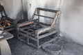 Chair and furniture in room after burned by fire in burn scene