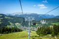 Chair lift above the village of La Clusaz, France Royalty Free Stock Photo