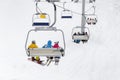 Chair lift transports skiers Royalty Free Stock Photo