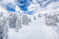 Chair lift in Tyrolian Alps in Kitzbuhel, Austria, Europe.