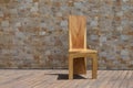 Chair made of solid wood on a stone background