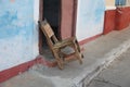 Chair outside the door in the city of Trinidad, Cuba Royalty Free Stock Photo