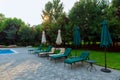 chair relax on in holiday swimming pool with clear blue water Royalty Free Stock Photo