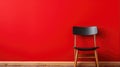 A chair sitting in front of a red wall, AI