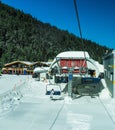 Chairlift for skiers on a rope Royalty Free Stock Photo