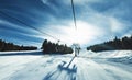 Chairlift for skiers on a rope Royalty Free Stock Photo