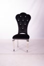 Black velvet fabric with diamante decoration. Polishes steel chair. on a white background