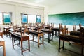 chair and table in class room with black board Royalty Free Stock Photo