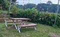 Chair table in the middle of the garden Royalty Free Stock Photo