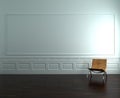 Chair to face a blank wall Royalty Free Stock Photo