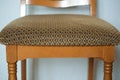 Chair with upholstered checkered seat