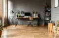 Grey spacious home office interior Royalty Free Stock Photo