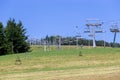 Chairlift in Beskid SÃâ¦decki on a sunny summer day, empty ski lift in summer Royalty Free Stock Photo